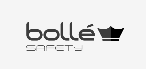 Een afbeelding van een transparante Bollé Safety veiligheidsbril met rood-zwarte pootjes
