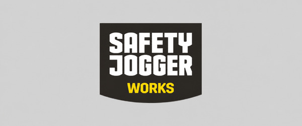 Safety Jogger Works-logo in witte en gele letters op een donker vlak, geplaatst op een lichtgrijze achtergrond.