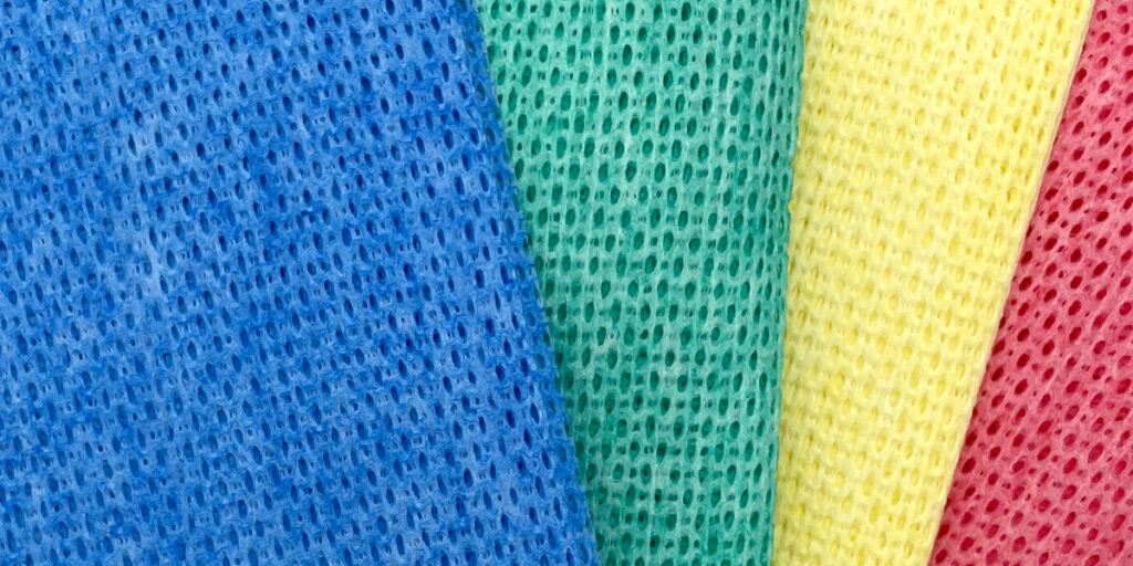 Close-up of hygienic wiping cloths in different colours.