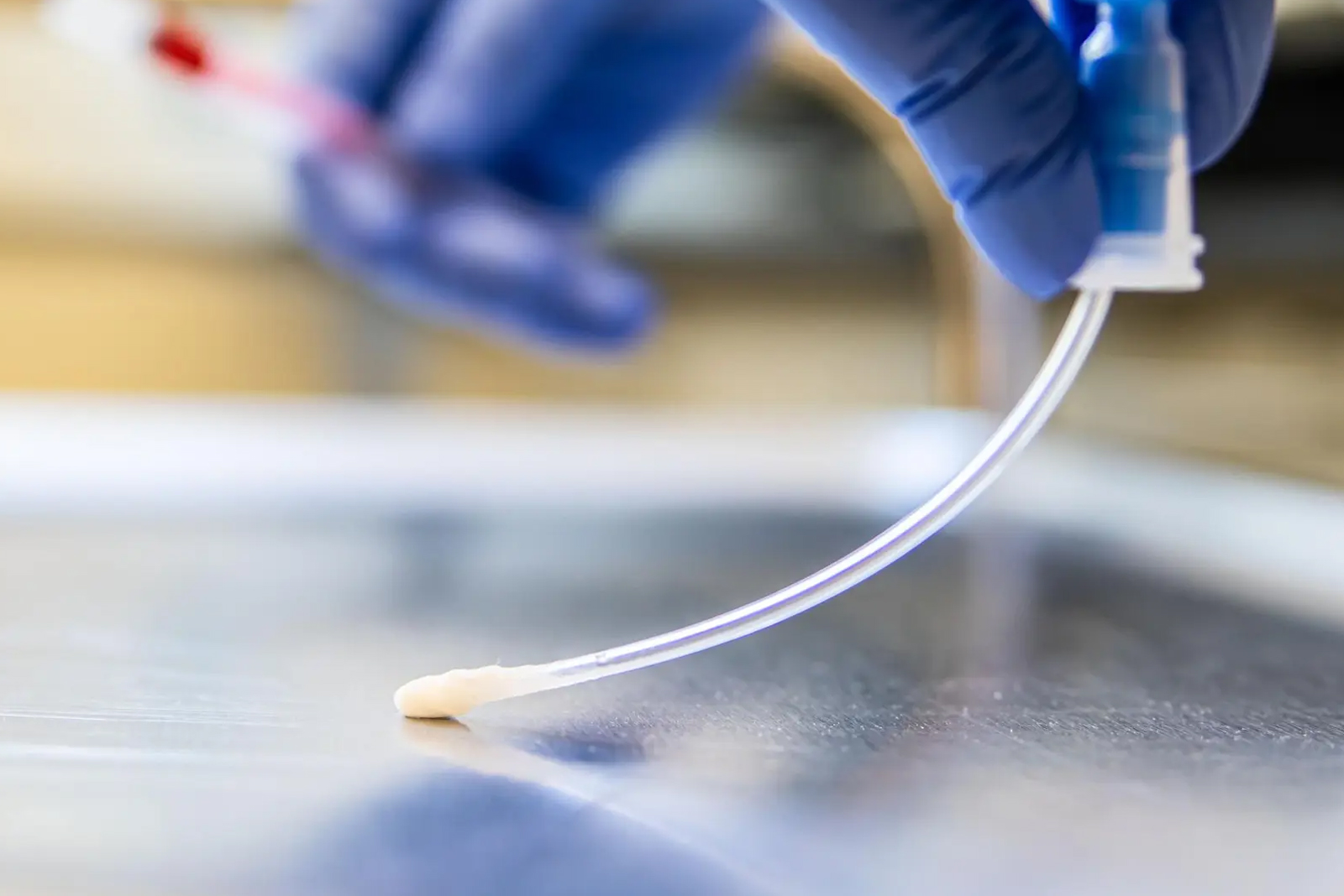 Hygiena ATP swab taking a surface sample in a dairy production environment.