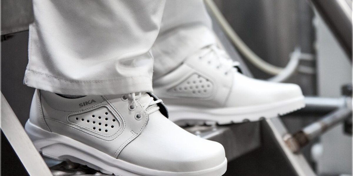 White Sika safety shoes in an industrial working environment